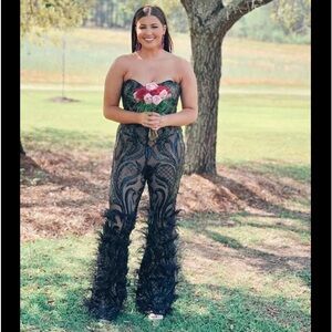 Size 8 Jovani jumpsuit. Worn once for prom